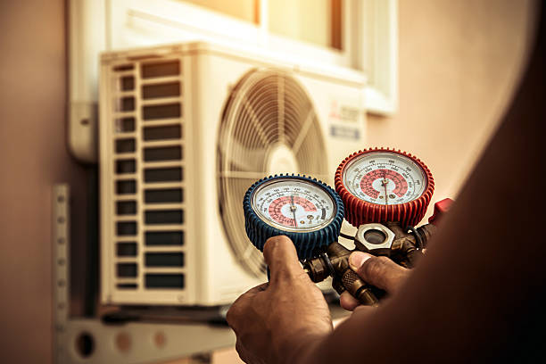 Professional Heat Pump Repair technician working in Hurley, WI